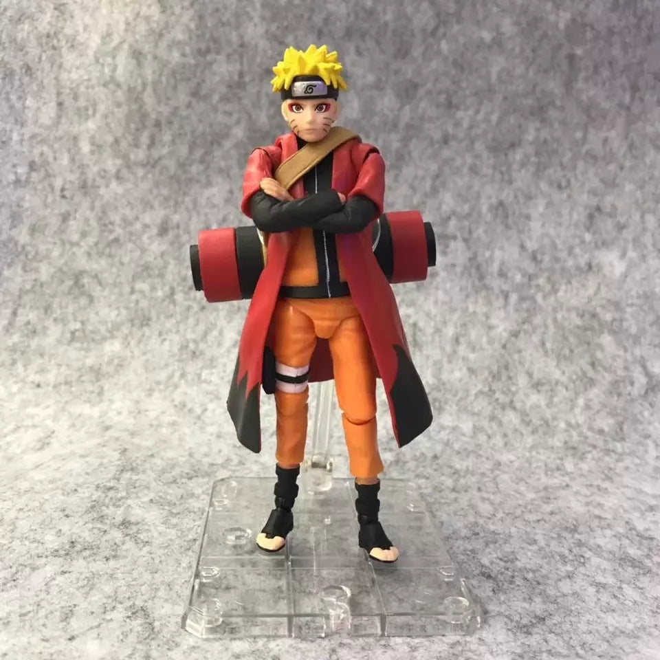 Figurine naruto uzumaki avec tete interchangeable et accessoires