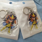 Porte clef Saint Seiya chevalier d'or au choix accessoires gold saints