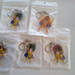 Porte clef Saint Seiya chevalier d'or au choix accessoires gold saints