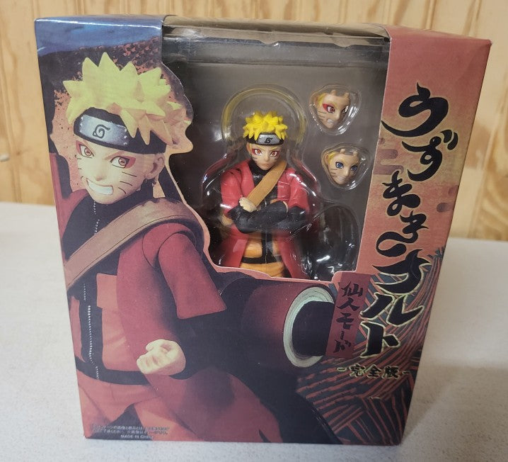 Figurine naruto uzumaki avec tete interchangeable et accessoires