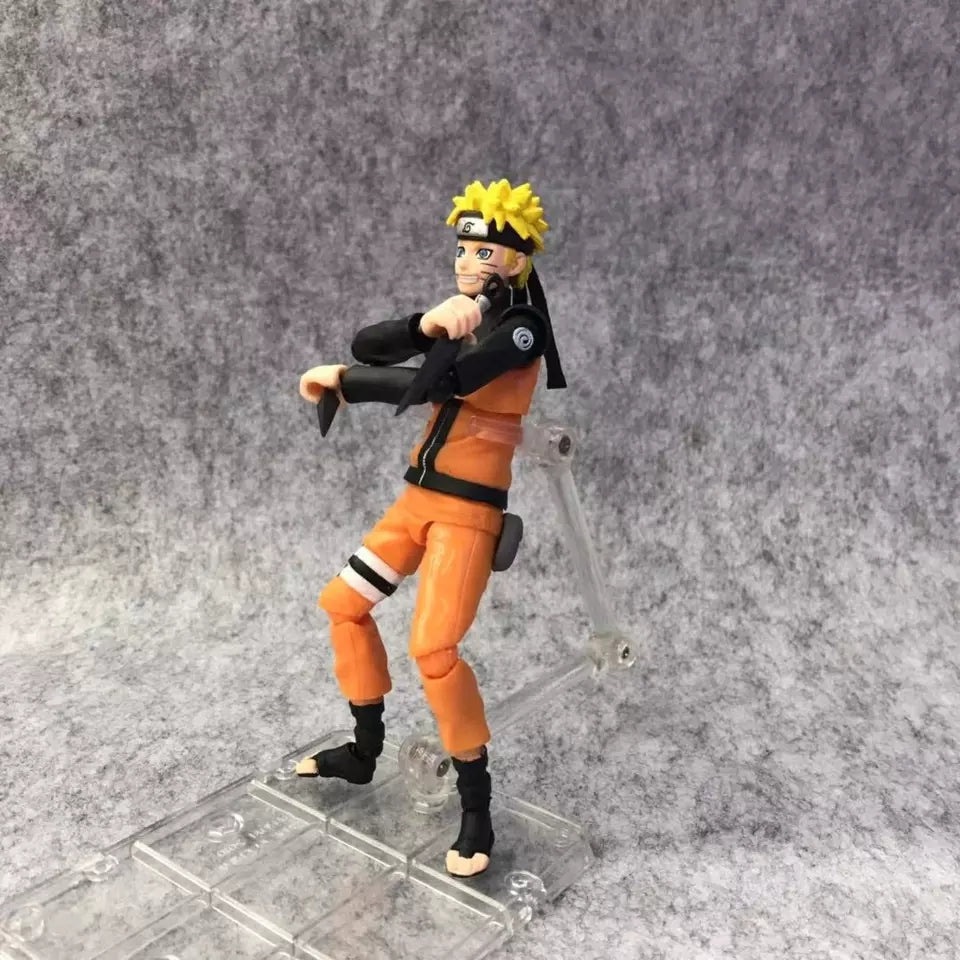 Figurine naruto uzumaki avec tete interchangeable et accessoires