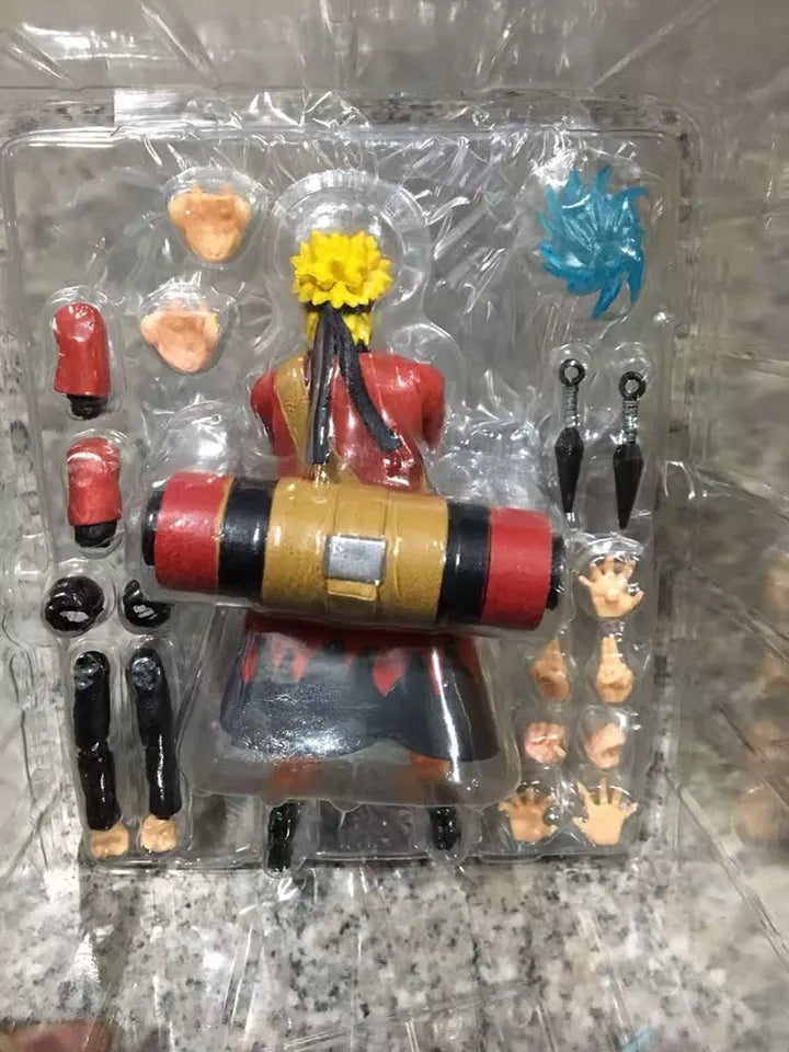 Figurine naruto uzumaki avec tete interchangeable et accessoires